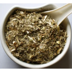 Blessed Thistle Herb Herba Organica in a ceramic bowl showing dried leaves and stems with natural texture