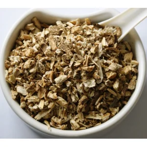 Angelica Root Herba Organica in a ceramic bowl showing its natural dried structure and warm, earthy tones